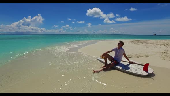 Romantic couple suntan on tranquil island beach journey by blue ocean and white sand background of t