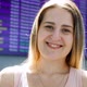 Video of Beautiful Smiling Blonde Woman Looking in Camera at International Airport Terminal - VideoHive Item for Sale