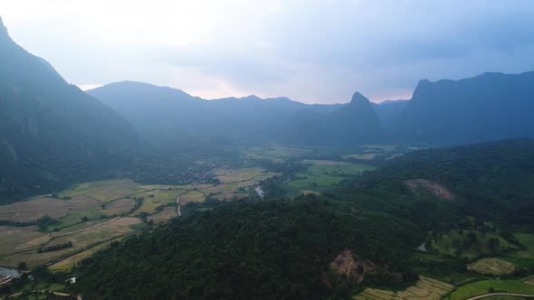 Fields and nature near town of Vang Vieng in Laos seen from the sky