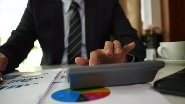 Businessman hands doing analysis planning business project in office.