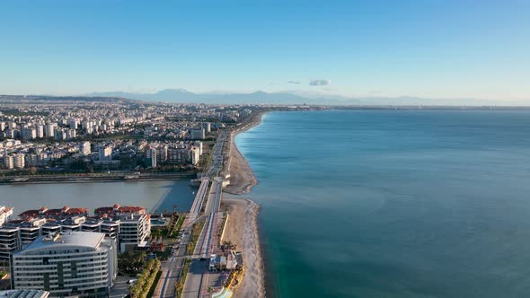 A mountain river flows into the sea Aerial View 4 K Antalya Turkey