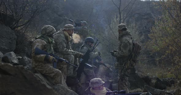 Soldiers Taking a Break From Patrol alt