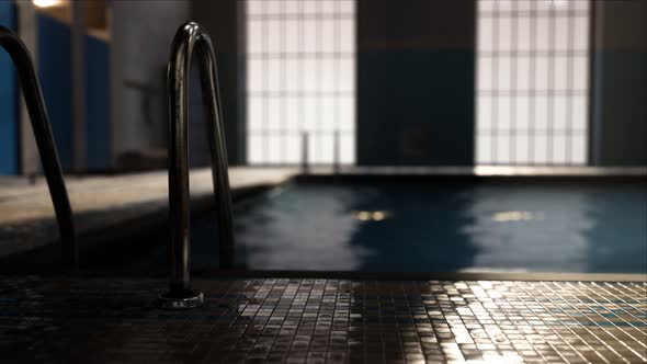 The View of an Empty Public Swimming Pool Indoors alt