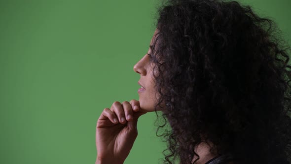 Profile View of Young Beautiful Hispanic Woman Thinking Ready for Gym