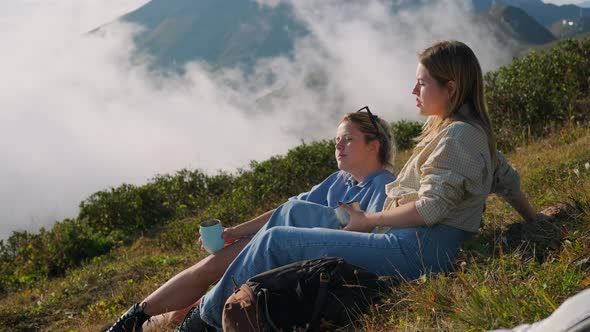 Young Women on Top of Hills Summer Hiking