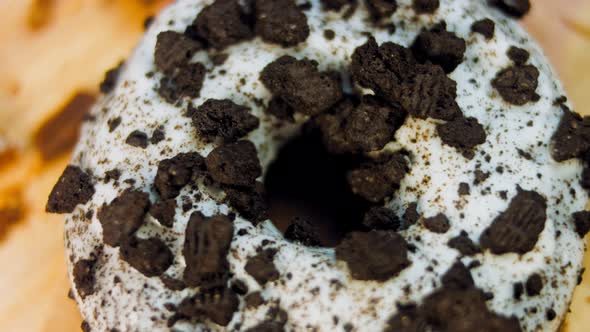 Chocolate Donuts Decorated with Pieces of Oreo Biscuits