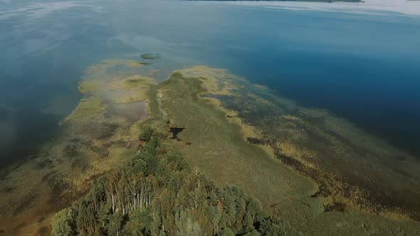 Aerial Drone Video Over a Natural Shallow in the Middle of the Lake