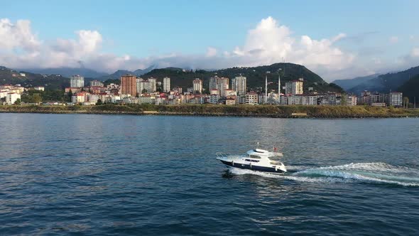 Trabzon City Mountains Sea And Following Speed Boat Aerial View 5