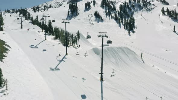 Aerial View on Ski Chairs at the Mammoth Mountain Resort on Sunny Winter Day USA