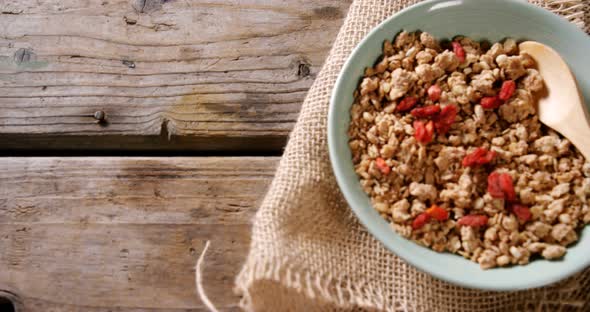 Bowl of breakfast cereal on textile