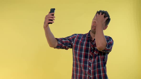 Attractive Tall Boy Making Selfie on Smartphone