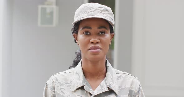 Animation of african american female soldier looking at camera