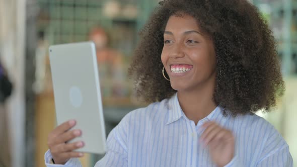 African Woman Doing Video Call on Digital Tablet 