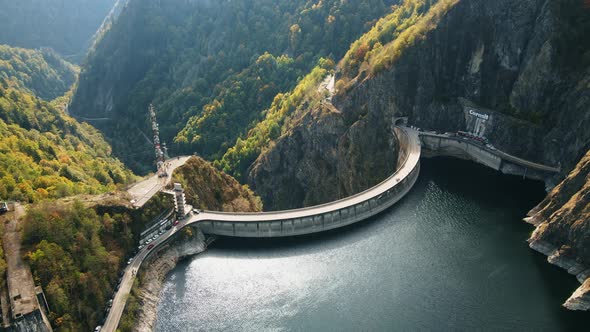 Aerial drone view of nature in Romania. Valley in Carpathian mountains with Vidraru dam and lake