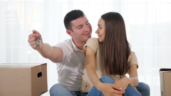 Husband Gives Keys to Nice New House to Smiling Wife