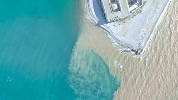 Aerial view of river and sea waters mixing in Rio, Patras city, Greece.