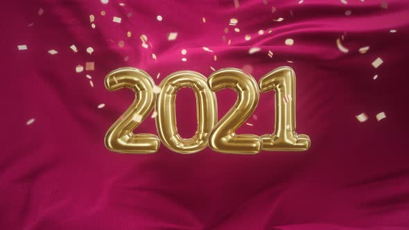 Inscription 2021 From Golden Balloons on a Wave Red Satin Fabric with Confetti