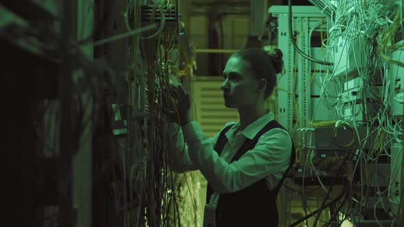 Female Engineer in Data Center Room