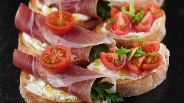 bruschetta with italian prosciutto or ham top view