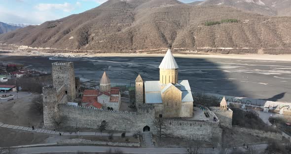 Aerial view of old Ananuri Fortress with two churches and picturesque view on river. Georgia 2022
