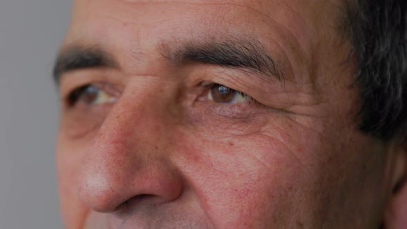 Close Up Face and Eyes of an Senior Asian Man