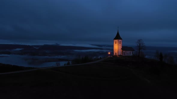 Church of St. Primoz and Felicijan at Night. Jamnik, Slovenia. Aerial View