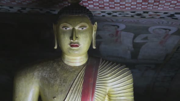DAMBULLA, SRI LANKA - FEBRUARY 2014: Close up view of sitting Buddha at the Golden Temple of Dambull