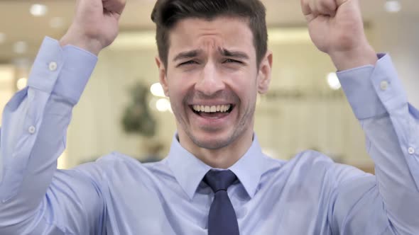 Winning Businessman Celebrating Success