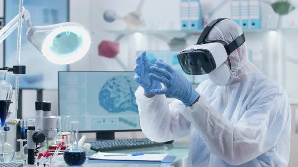 Scientist Using VR Headset and Virtual Reality To Learn and Discover New Things alt