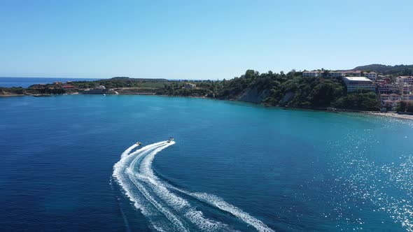 Aerial View of a Motor Boat Towing a Tube, Zakynthos, Greece