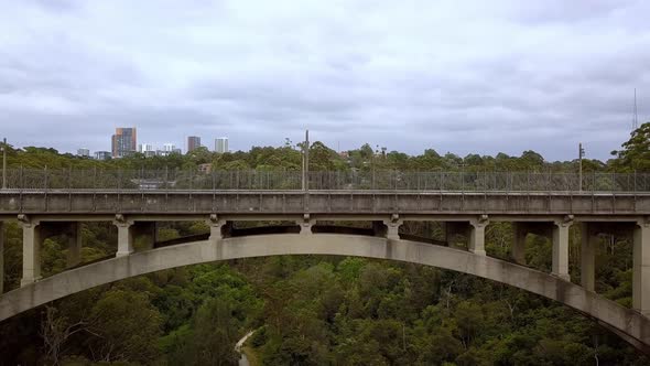 Aerial view of Long Gully Suspension Bridge in Northbridge area of Sydney, Australia, drone dolly-ou