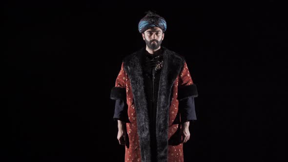 Ottoman Sultan.Black background.