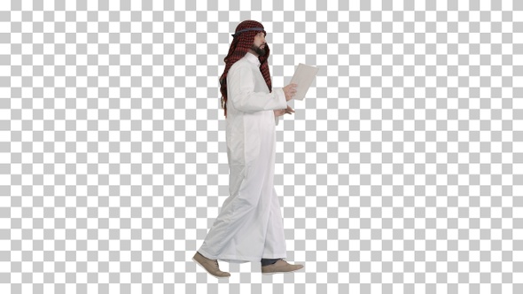 Sheikh using digital tablet and walking, Alpha Channel