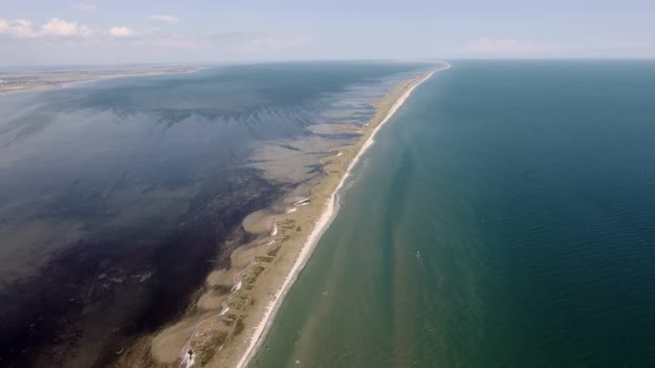 Aerial Shot of a Straight Sandspit at the Black Sea Shoal on Sunny Day in Summer