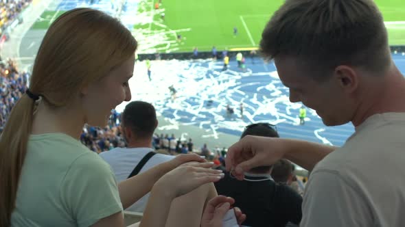 Man Making Proposal to Girl at Stadium, Life Companion and Common Interests