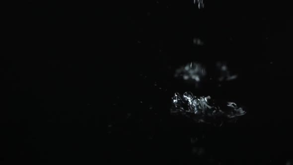 Slow Motion Footage Water Drops On Black