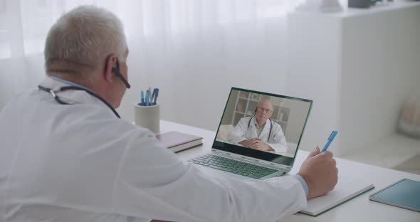 Online Council of Professors of Medicine By Video Chat, Male Doctors Are Conferring Remotely By