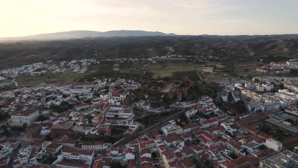 Rotating aerial showing the castle and old town in Silves, Portugal