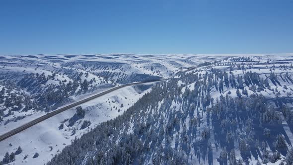 Road In Snowy Valley