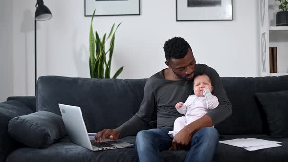 A Father Is Working From Home