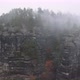Mystical landscape Forested Mountains Bohemian Switzerland. Rocks in foggy - VideoHive Item for Sale