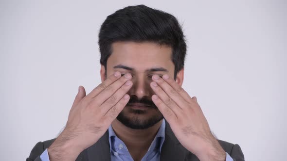 Young Handsome Bearded Indian Businessman Covering Eyes As Three Wise Monkeys Concept
