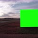 Aerial Drone Footage of Big Billboard with Green Screen near Busy Highway or Motorway at Sunset - VideoHive Item for Sale