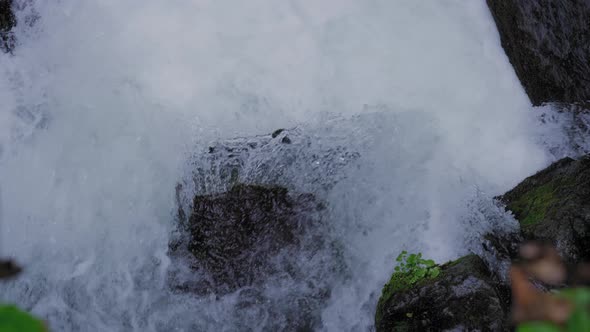 Waterfall falling over a rocky edge