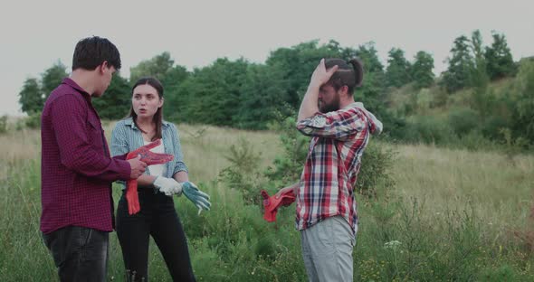 Young People Emotionally Talking Wearing Gloves and Smiling on Nature