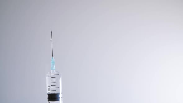 Close Up Medical Syringe Needle on White Background