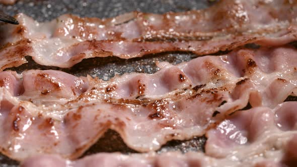 Macro Shot of the Bacon Cooking Process