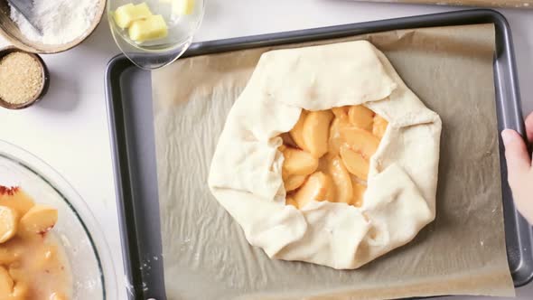 Step by step. Making peach galette with fresh local peaches.