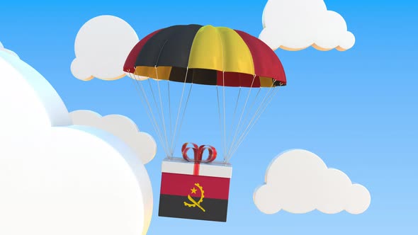 Box with National Flag of Angola Falls with a Parachute