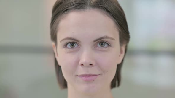 Close Up of Woman Looking at the Camera